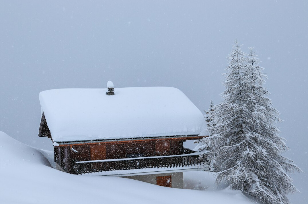 mountain cabin in snow